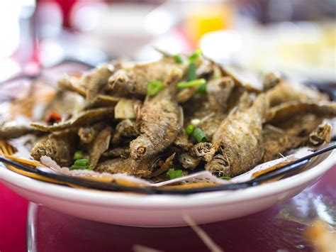  I Suzhou Taihu Cuìyú: Un Piatto Delizioso Con Una Texture Setosa e un Gusto Umami Profondo!